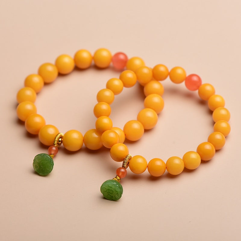 Lotus pod pendant natural beeswax bracelet